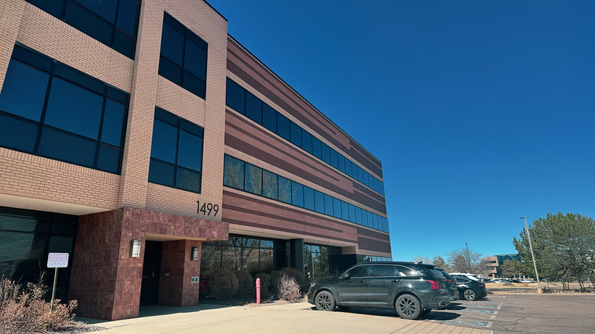 UQUAL headquarters office building