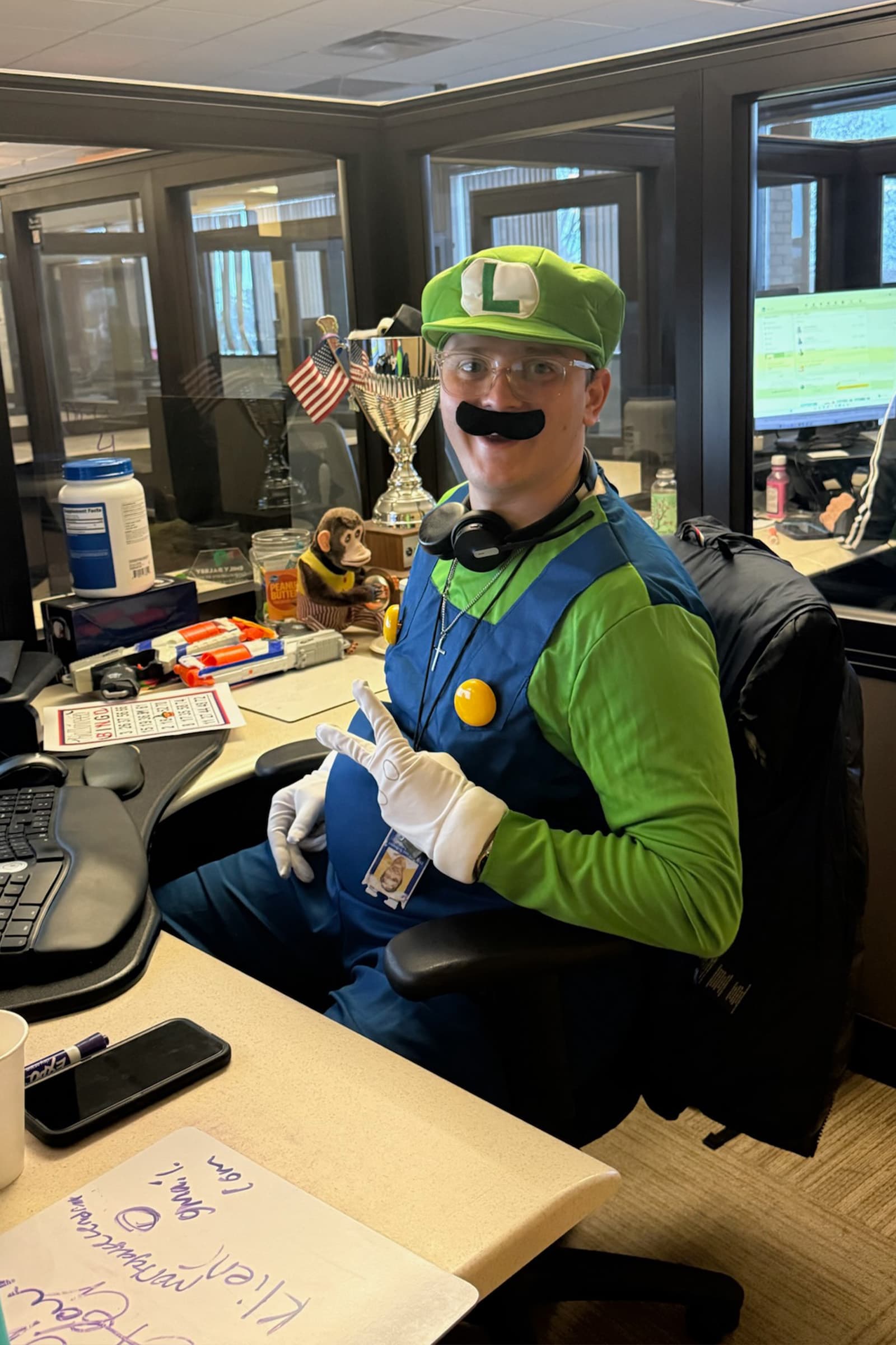 UQUAL team member in Halloween costume at the office